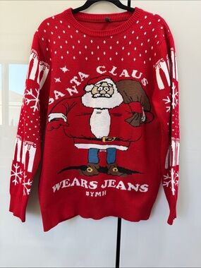 Santa wears jeans Christmas sweater
